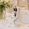 Grand figurine des mariés 'Couple sur le vélo' - The-Weddingshop